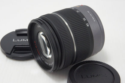 美品 Panasonic LUMIX G VARIO 14-42mm F3.5-5.6 ASPH. MEGA O.I.S H-FS014042 マイクロフォーサーズ フード付 260728q