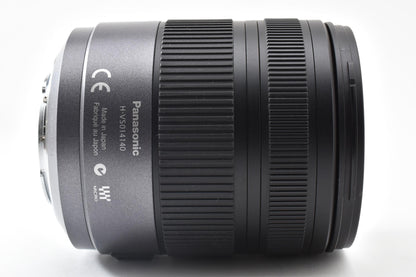 良品 Panasonic LUMIX G VARIO HD 14-140mm F4.0-5.8 ASPH. MEGA O.I.S. H-VS014140 AFレンズ マイクロフォーサーズ フード付 260921g