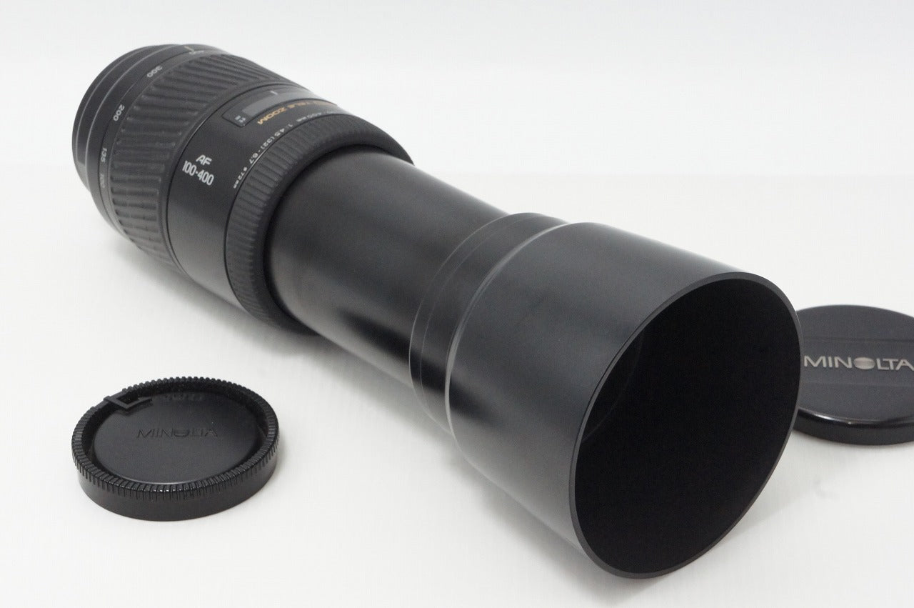 良品 MINOLTA AF APO TELE ZOOM 100-400mm F4.5-6.7 SONY αマウント フルサイズ ズームレンズ フード付 260602b